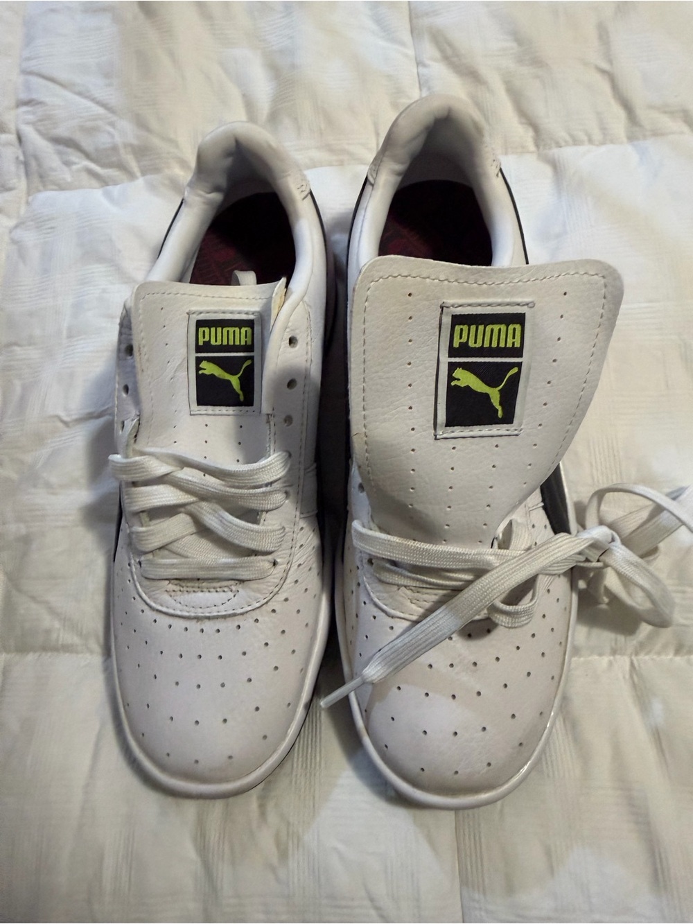 Puma White Low-Top Sneakers with Black and Neon Yellow Logo